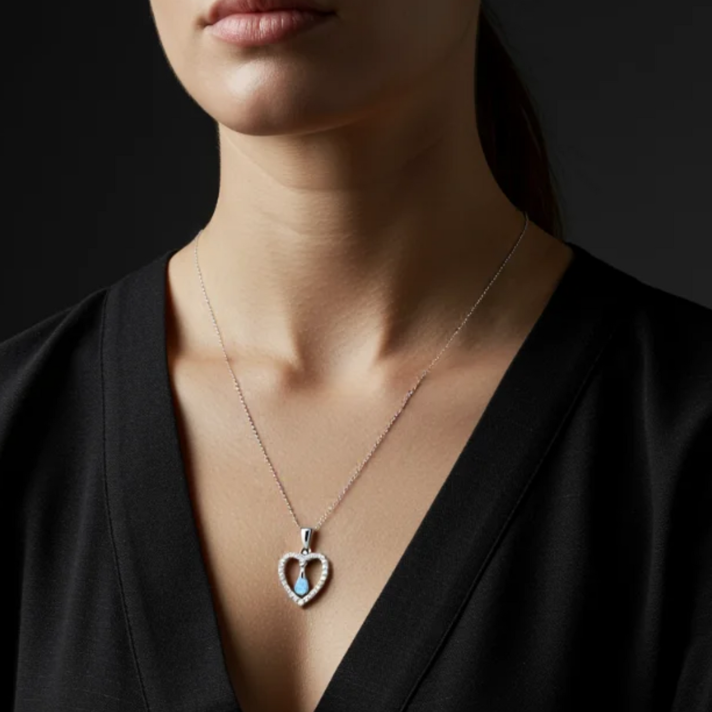 Blue Whisper Heart Topaz Pendant